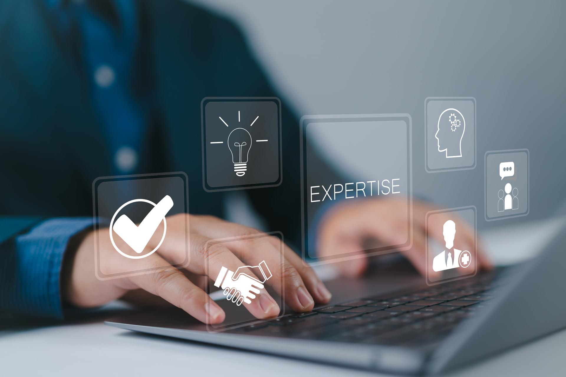 Expertise business consulting concept. expert, consulting, knowledge, team, advice, trust and research. Businessman using laptop with expertise icon on virtual screen.